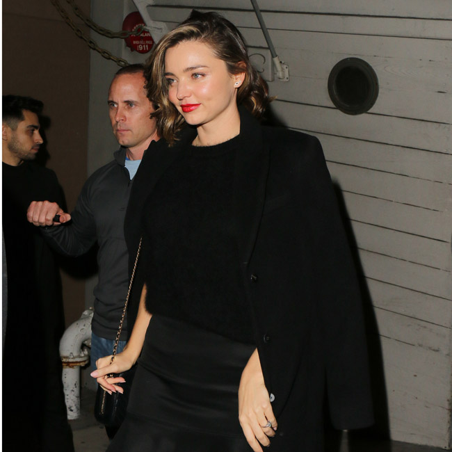 160314, Miranda Kerr and Fiance Evan Spiegel attend a Christmas Dinner Party at 'Giorgio Baldi' in Santa Monica. They then went to 'The Shore Bar' next door after dinner. They were surrounded by Heavily armed Body guards/security. Her Very Large Diamond engagement ring can be seen on her left hand. Los Angeles, California - Saturday December 17, 2016. Photograph: © MHD, PacificCoastNews. Los Angeles Office (PCN): +1 310.822.0419 UK Office (Photoshot): +44 (0) 20 7421 6000