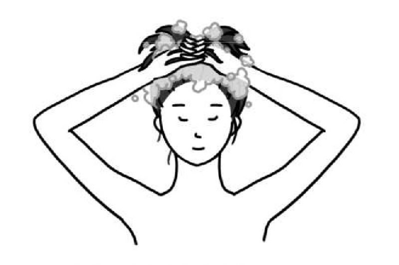 手全体で頭皮を引き上げるようにしてシャンプーしている女性のイラスト