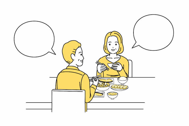 和食の食卓を囲う女性と男性