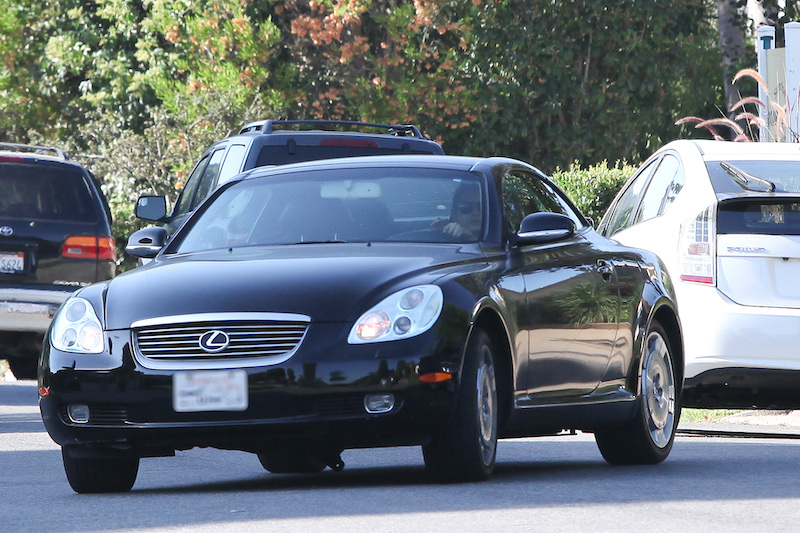 日本車のレクサスを選んでいたミラ・クニス（2012年8月8日、Ph/AFLO）